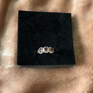 Lab Created Amethyst size 7 ring. Rhodium plated.